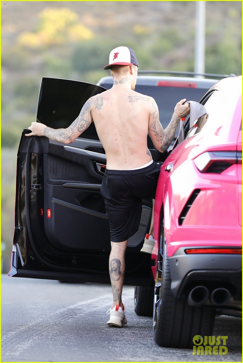 justin bieber shows off tattoos on shirtless hike with hailey 16