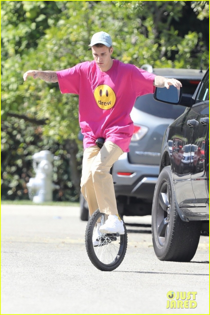 justin bieber falls off unicycle while learning how to ride 16