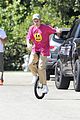 justin bieber falls off unicycle while learning how to ride 25