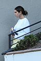 selena gomez goes cozy while meeting up with a friend 03