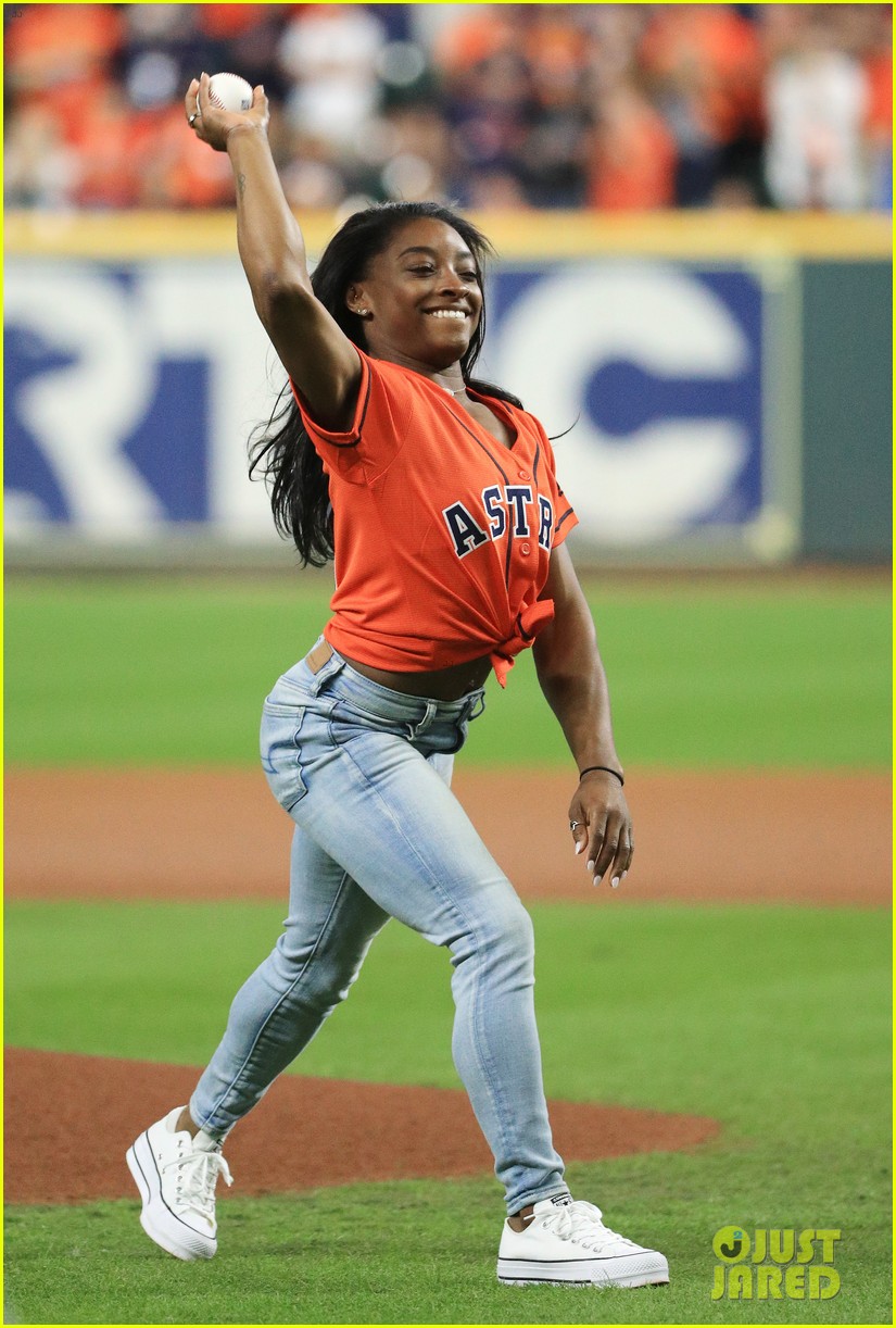 simone biles does backflip before throwing first pitch at world series game 01