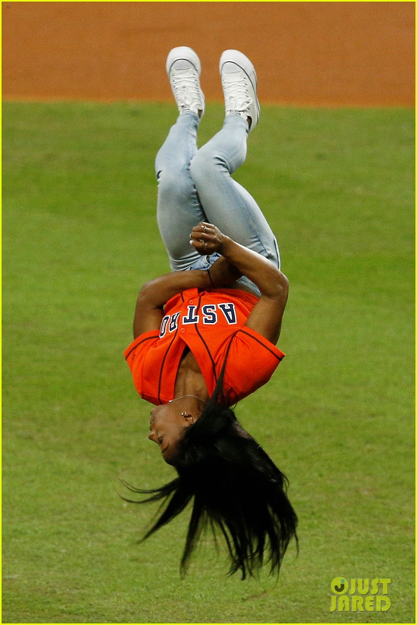 simone biles does backflip before throwing first pitch at world series game 13