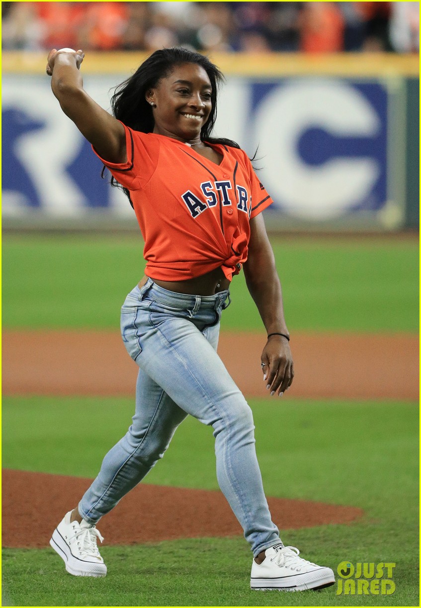 simone biles does backflip before throwing first pitch at world series game 14