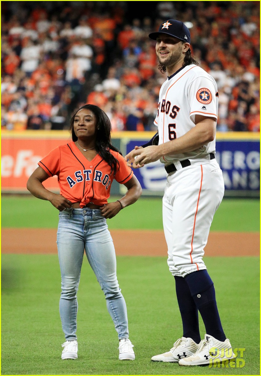 simone biles does backflip before throwing first pitch at world series game 18