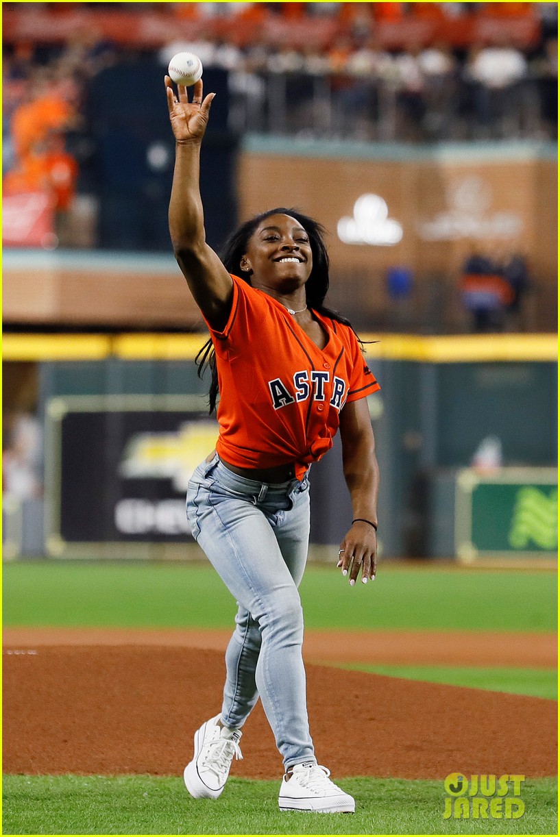 simone biles does backflip before throwing first pitch at world series game 19