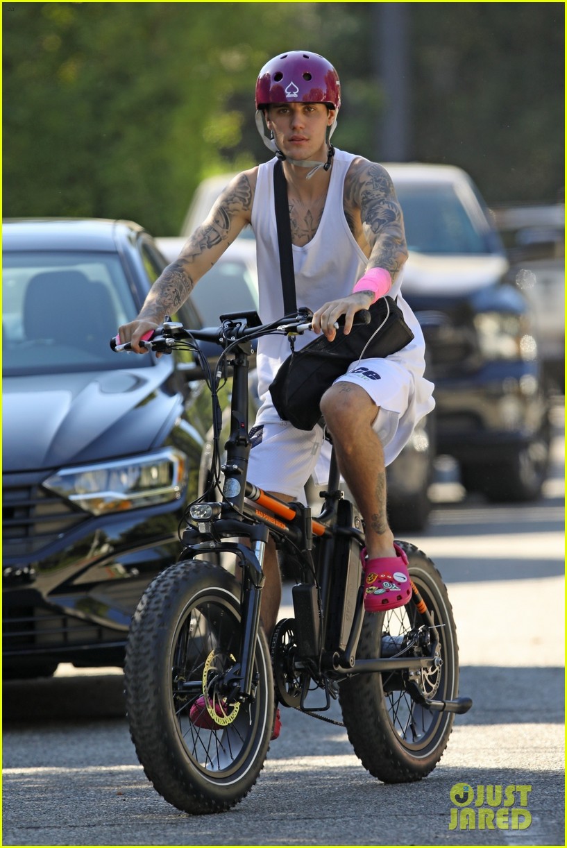 justin bieber takes bike ride while using his portable iv drip 12