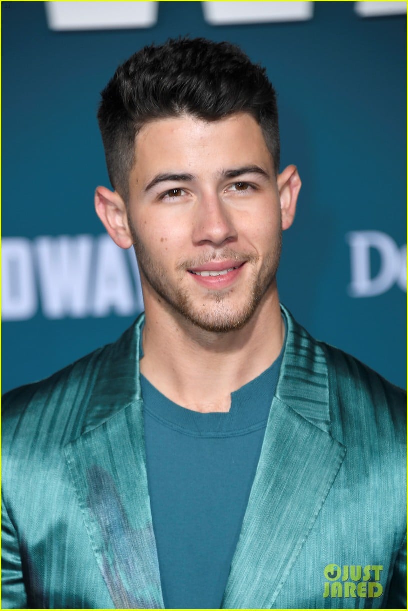 nick jonas sports silk teal suit for midway premiere 11