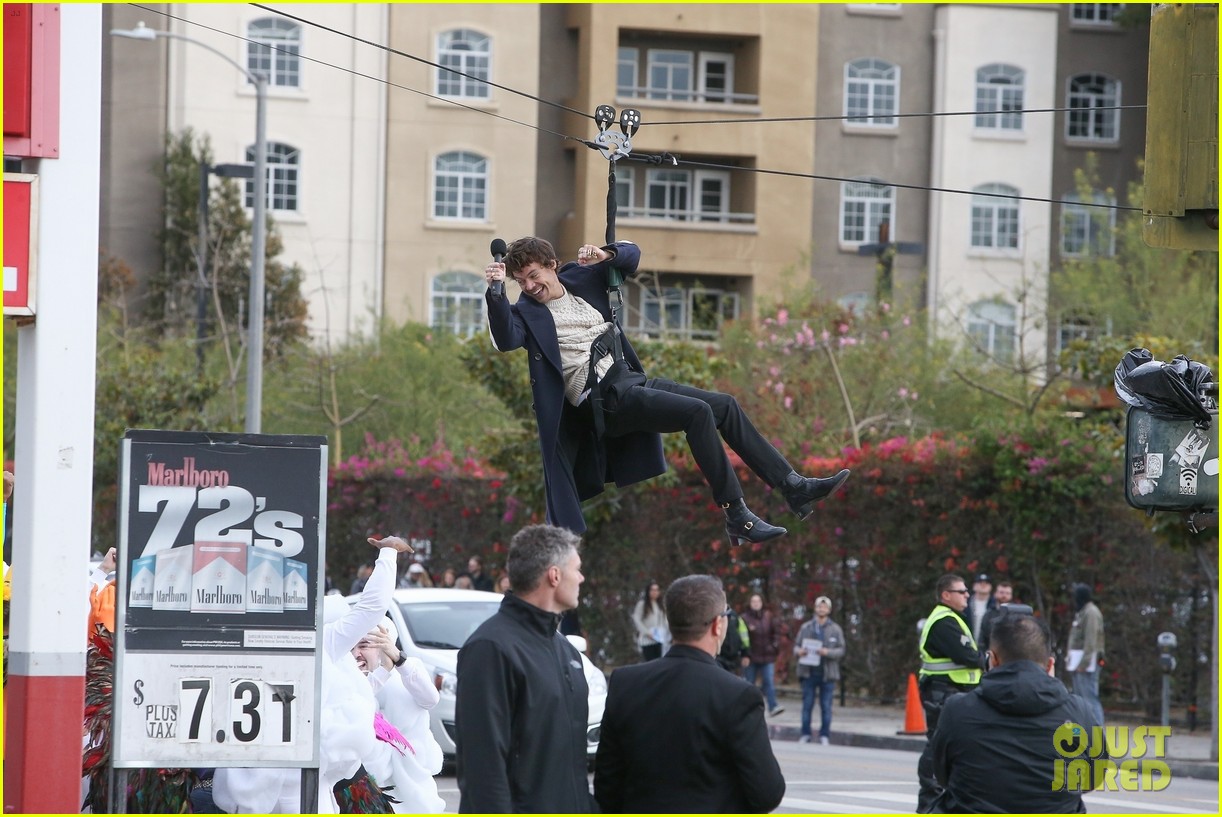 harry styles zip lines over la street for late late show segment 02