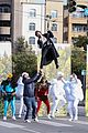 harry styles zip lines over la street for late late show segment 24