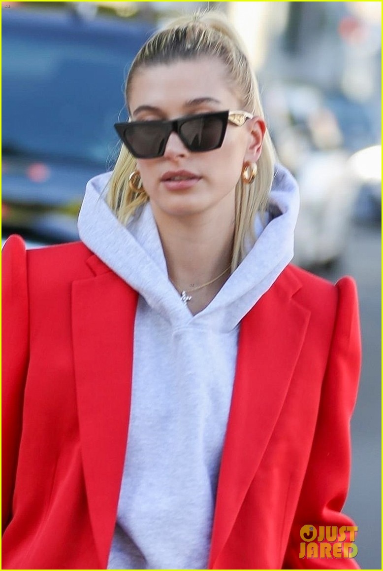 hailey bieber red suit dog ruins tree 03