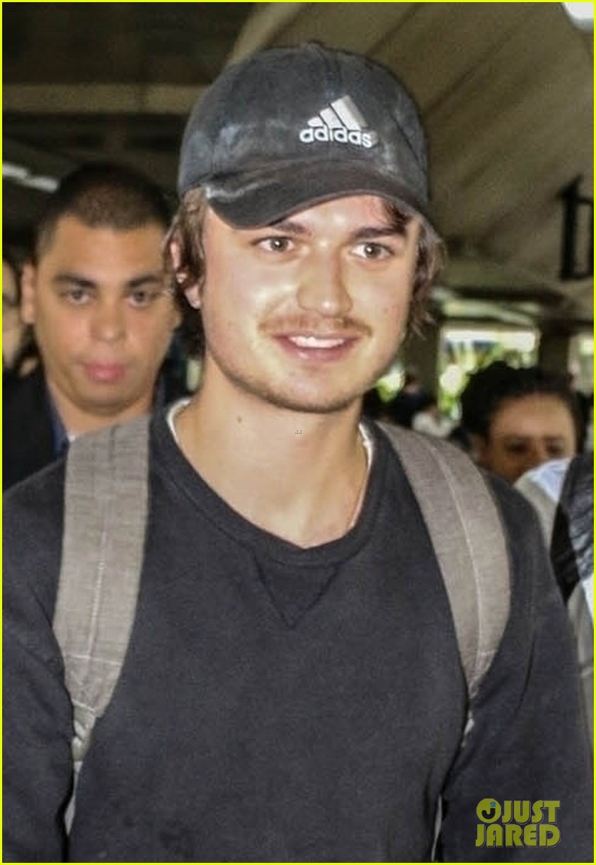 joe keery gets mobbed by fans upon brazil arrival 02