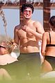charles melton goes shirtless while vacationing with friends 03