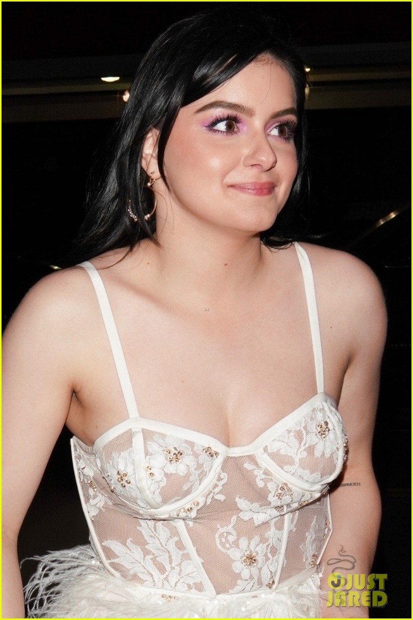 Ariel Winter shows off her lace bra under low-cut top on date