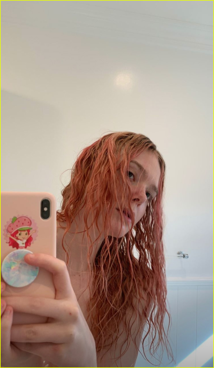 elle fanning debuts newly dyed pink hair
