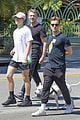 tommy dorfman takes his dog for a walk with friends 01