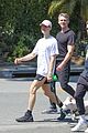 tommy dorfman takes his dog for a walk with friends 02