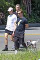 tommy dorfman takes his dog for a walk with friends 04