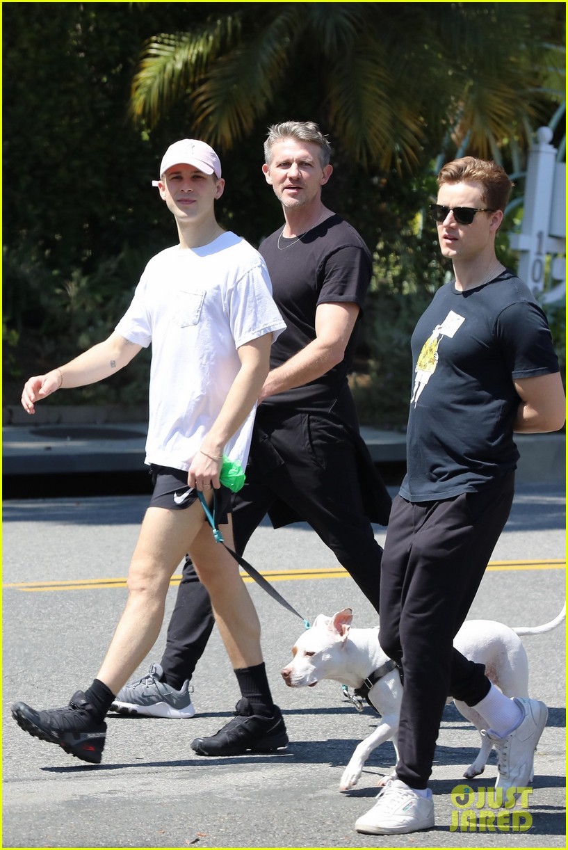 tommy dorfman takes his dog for a walk with friends 03