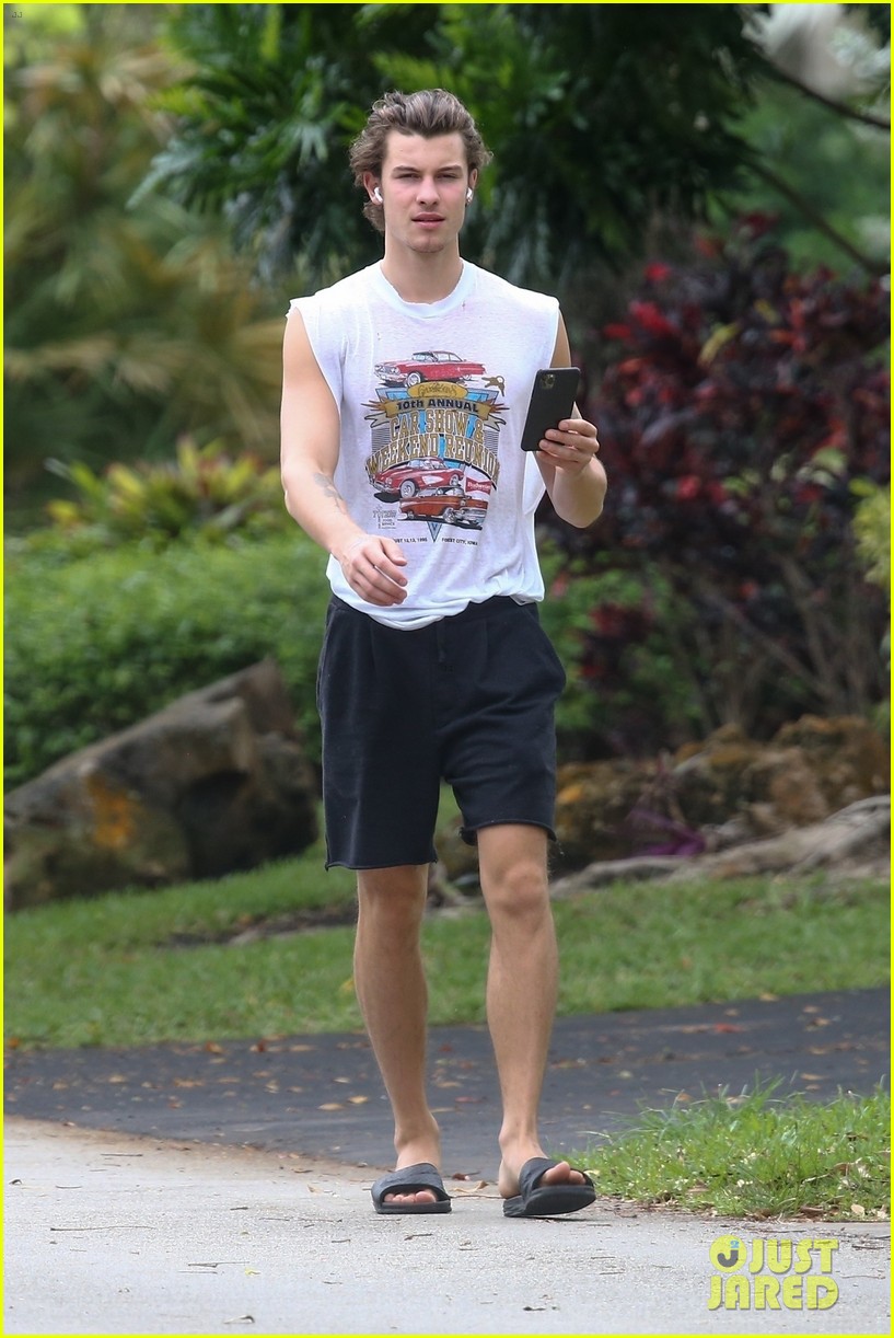 shawn mendes takes a call during his neighborhood stroll 15