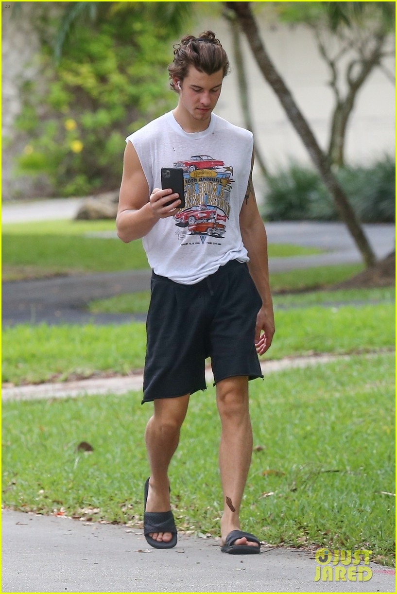 shawn mendes takes a call during his neighborhood stroll 17
