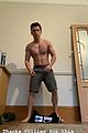 tom holland shows off muscular body while putting on a shirt while doing handstand 02