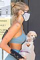 kaia gerber blue look carrying puppy 02
