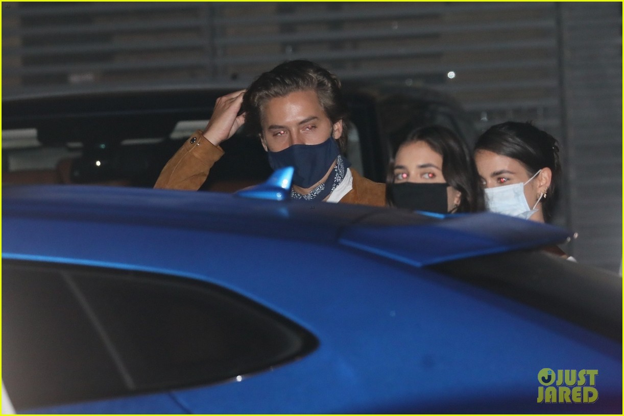 cole sprouse surrounded by ladies after dinner 16