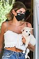 kaia gerber pet store with puppy milo 04