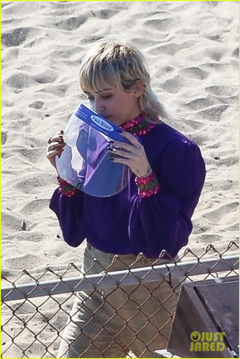 miley cyrus filming new music video at beach 59