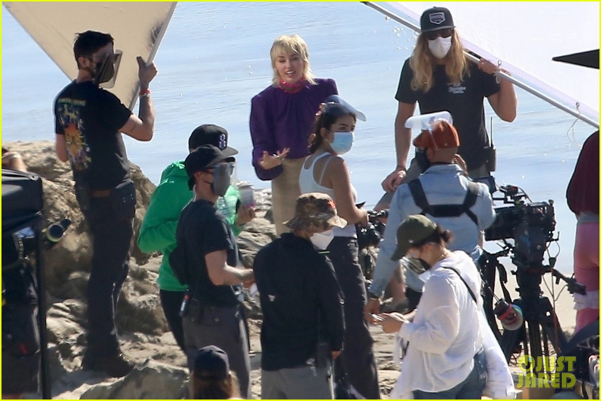 miley cyrus filming new music video at beach 80