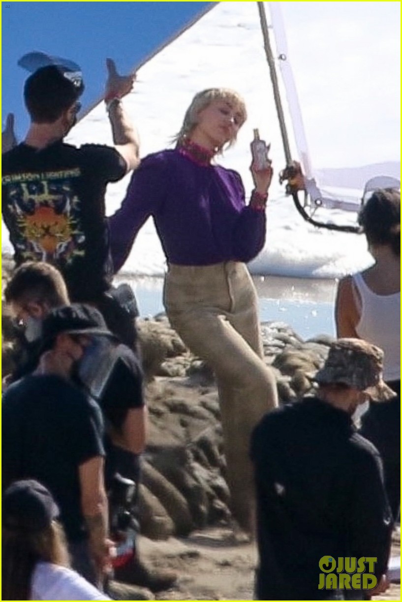 miley cyrus filming new music video at beach 83