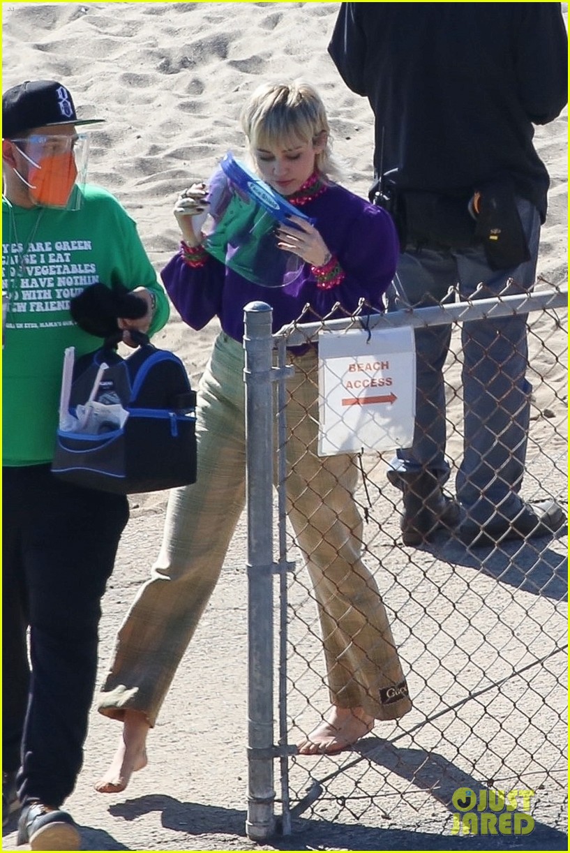 miley cyrus filming new music video at beach 97