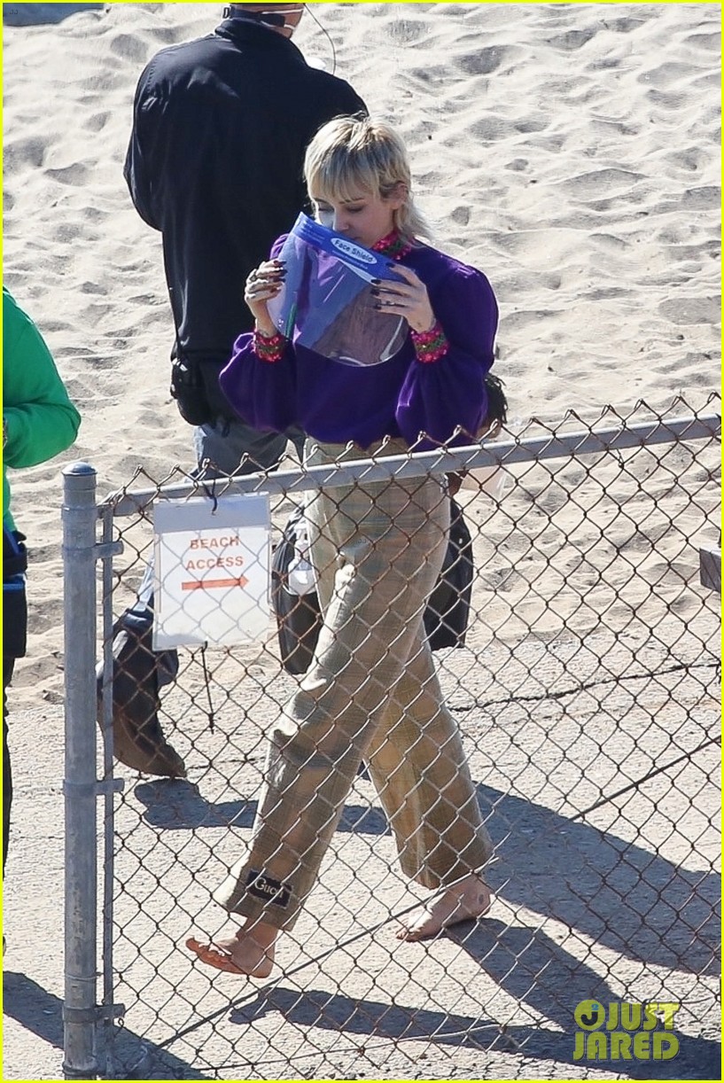 miley cyrus filming new music video at beach 99