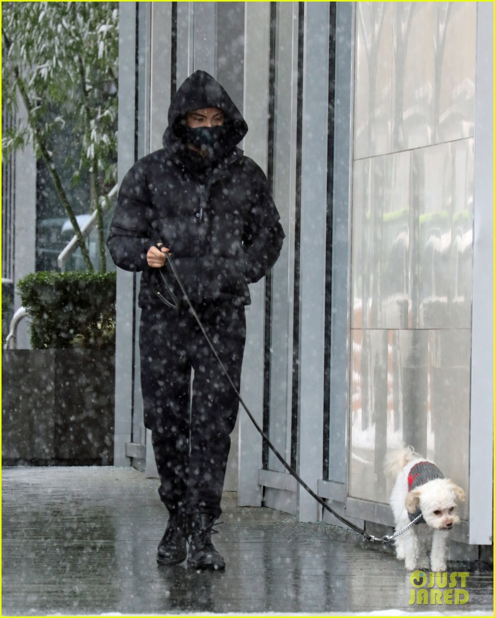 camila mendes madelaine petsch walk their dogs in the snow 02