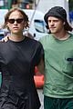 tommy dorfman lucas hedges wrap their arms around each other in nyc 06