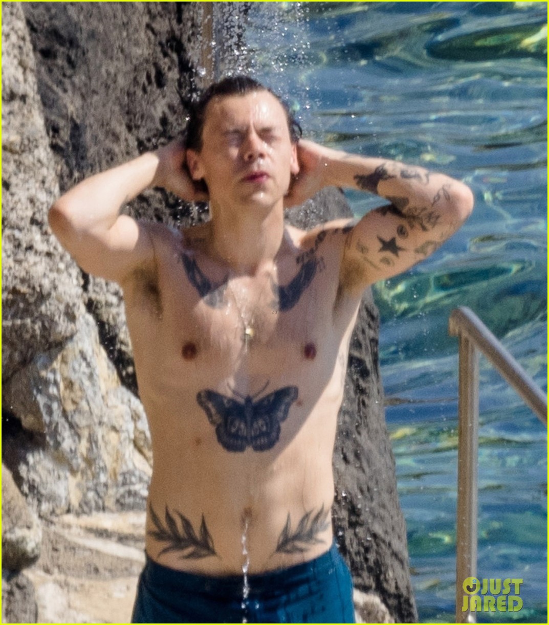 harry styles showers shirtless in italy 16