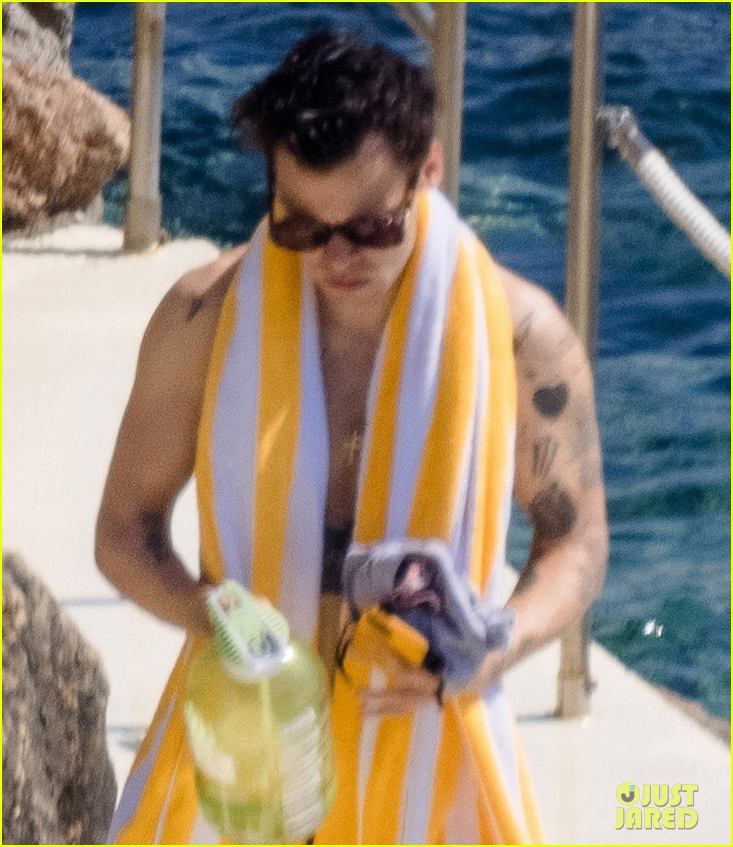 harry styles showers shirtless in italy 20