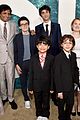 alex wolff poses with younger self nolan river at old premiere 03