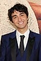 alex wolff poses with younger self nolan river at old premiere 10