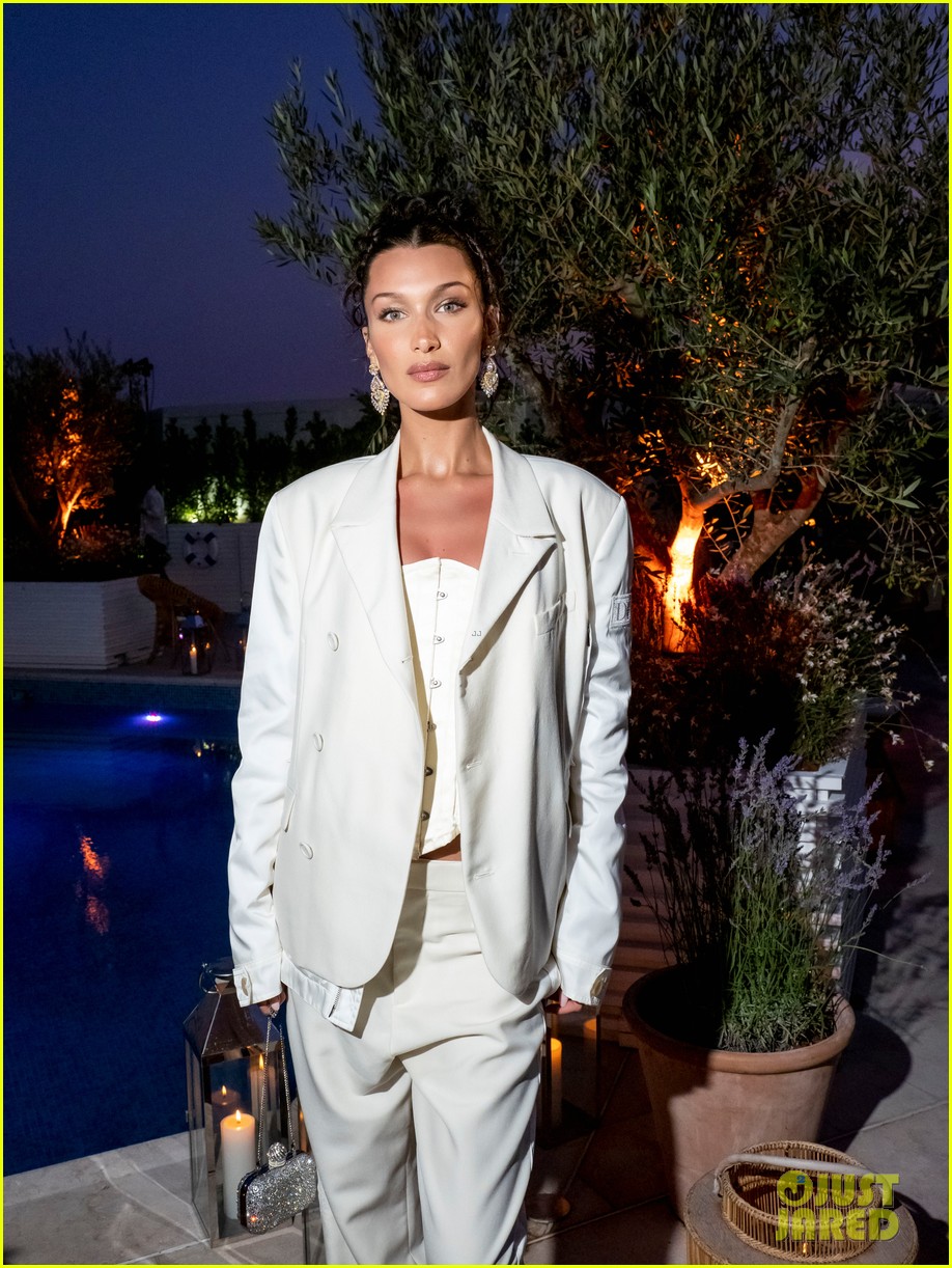 bella hadid wears all white for the dior x vogue dinner in cannes 06