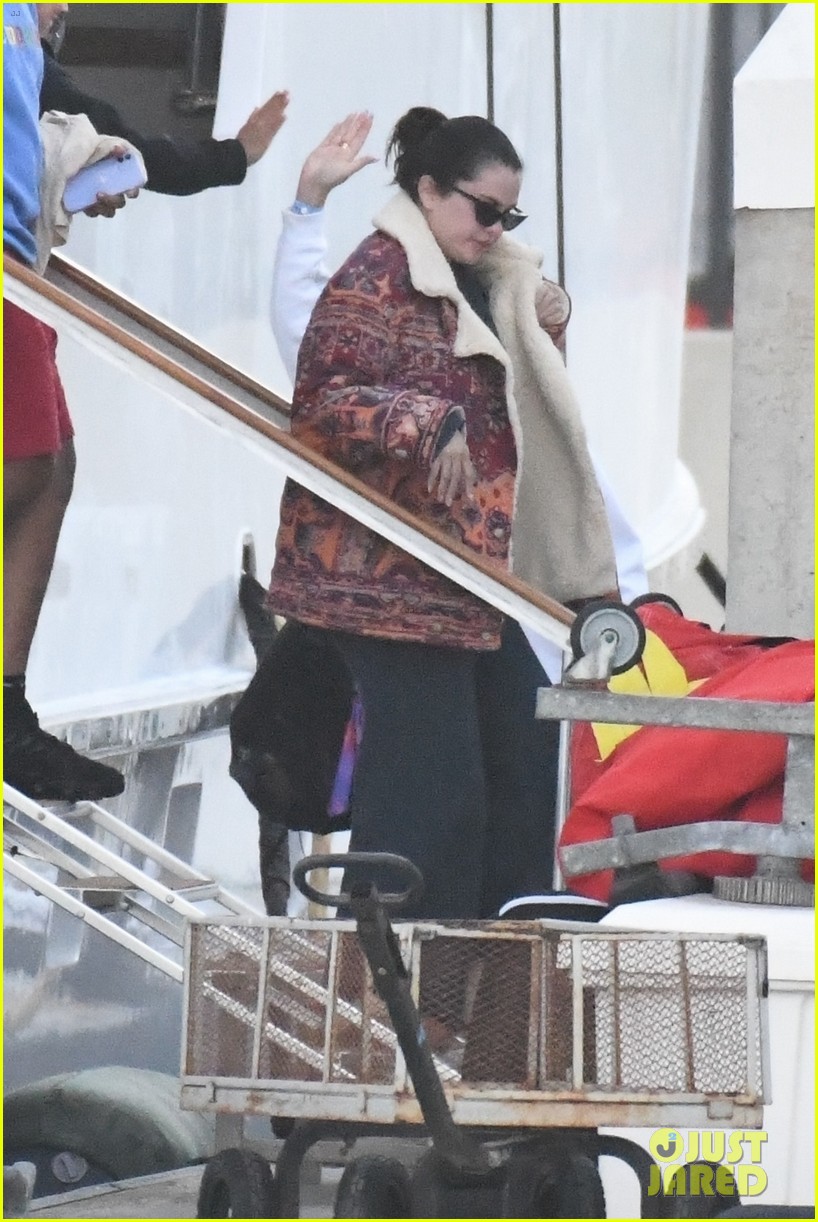 selena gomez boards a yacht for quick trip with friends 01