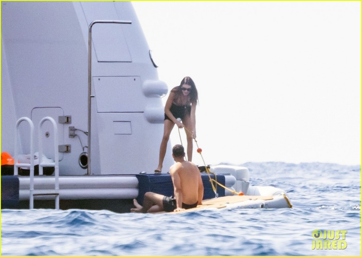 kendall jenner lounges on float in the water 19