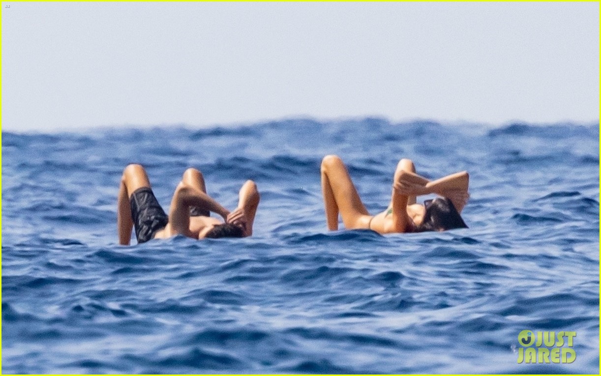 kendall jenner lounges on float in the water 49