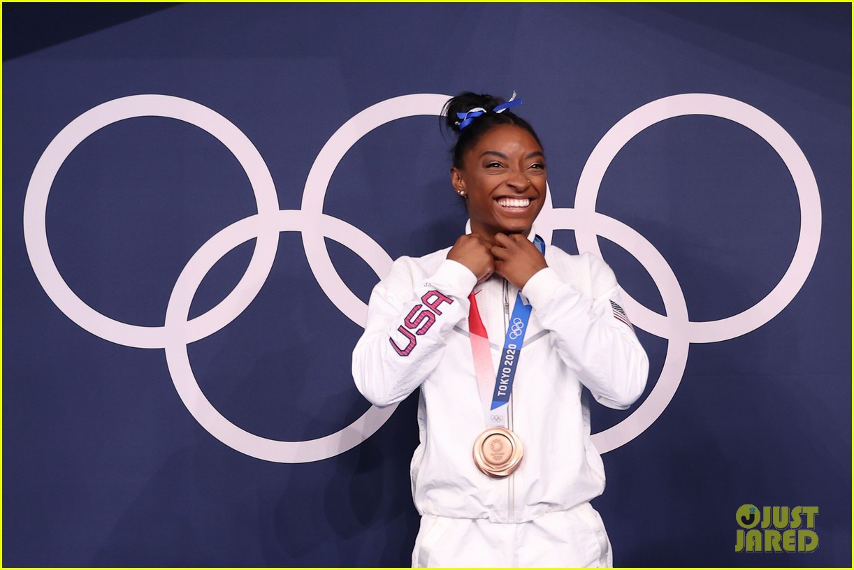 simone biles is beaming after winning bronze at tokyo olympics 12