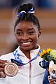 simone biles is beaming after winning bronze at tokyo olympics 03