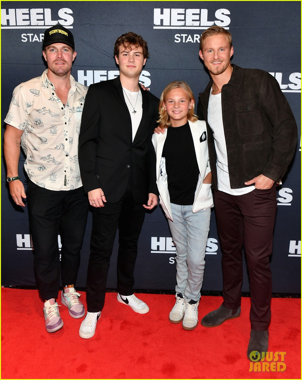 stephen amell alexander ludwig pose with younger selves at heels finale screening 03