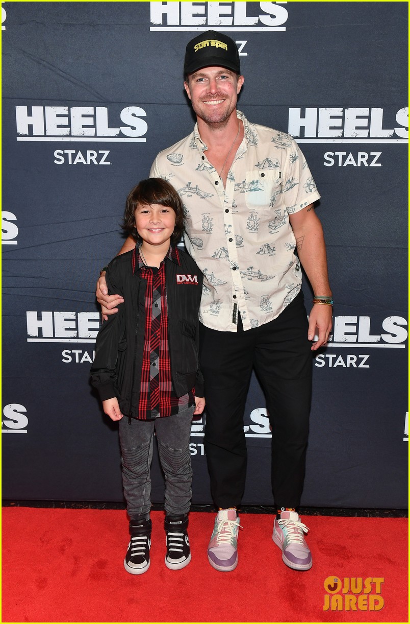 stephen amell alexander ludwig pose with younger selves at heels finale screening 10