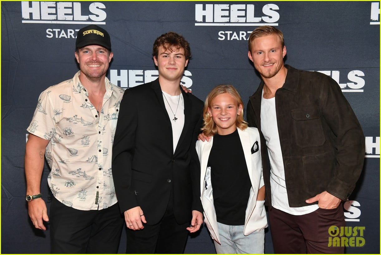 stephen amell alexander ludwig pose with younger selves at heels finale screening 13