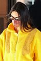 kendall jenner yellow hoodie jet out aspen 03
