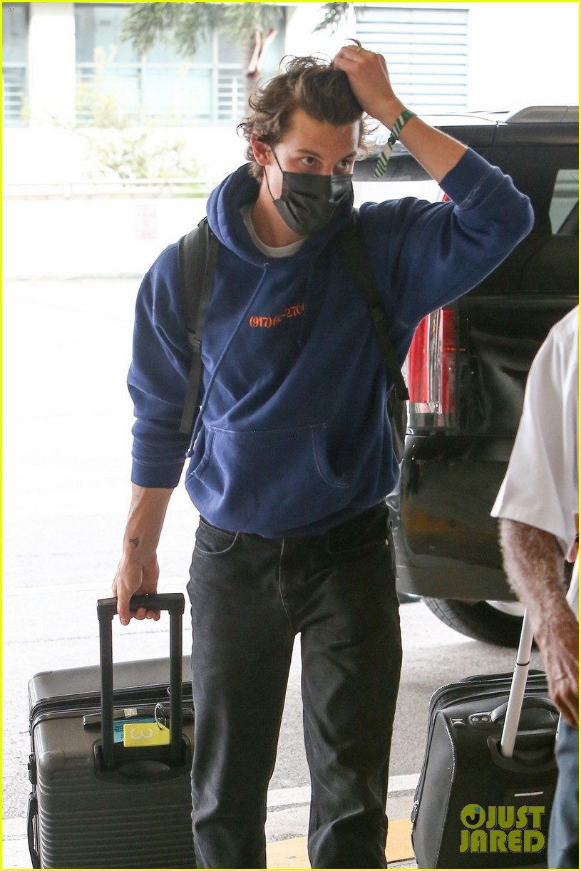 shawn mendes flying out of miami 08